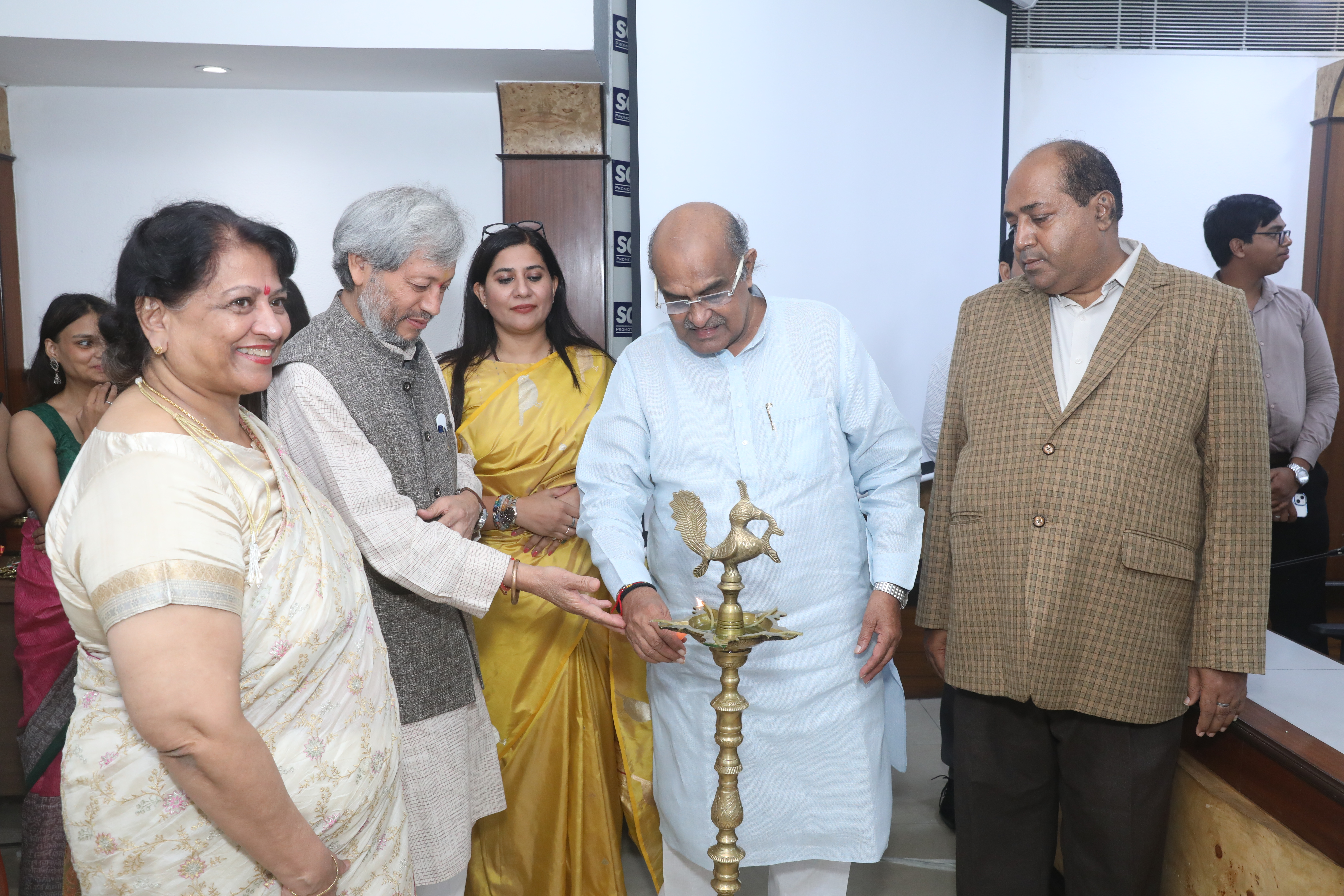 Shri K. C. Tyagi Ji Former Member of  Lok Sabha & Rajya Sabha &  Spoke Person JDU  New Delhi & Shri Tirath Singh Rawat Ji Honorable Former  Chief Minister & Member of Parliament  Uttarakhand & H. E. Dr. Janis Darbari Ji Honorary Consul General of the Republic of  Montenegro for India & Sunil Kukreja President NARF Lighting Lamp 